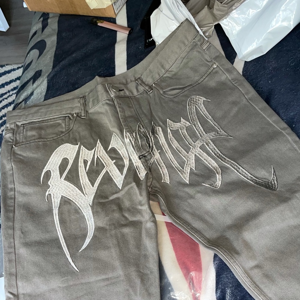 Revenge embroidered jeans